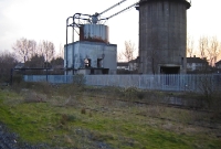 The Cabra cement terminal closed in 1999, although the silo and loading facilities remained in situ for several years after, as seen here in a derelict condition in 2005.