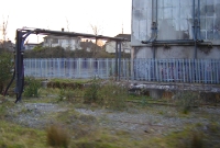 Today all the buildings associated with the cement terminal have been demolished, leaving just the derelict sidings in situ. This is another view from 2005, showing the pumping mechanism over the twin sidings which were once partly covered with a roof.