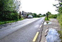 At the western end of Cappagh Station the line crossed the N72 road on the level. The line ran between the crossing keepers house on the left and the two surviving gate posts.