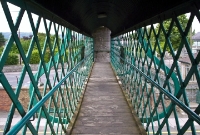 Walking across the Victorian era covered footbridge at Carlow Station. This is one of the few older footbridges to have been covered with a roof, and a such has a preservation order.