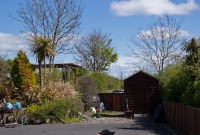 The single platform at the former Carrolls Cross Station remains, now part of the back garden of the former station house. It is located on the Waterford side of the level crossing. There was a loop siding at the station until closure to passenger and goods services in March 1967.