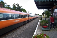 No.234 visible in the distance takes the Dublin bound train out of Westport Station. This view is from the down platform, disused since the 1980s although still kept near and tidy.