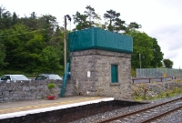 This is the small water tower located at the east end of the up platform at Castlebar Station. Like the other MGWR structures here, it is well preserved complete with tank.