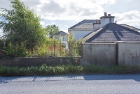 &#39;Ballyragget Rd&#39; crossing, the first level crossing on the branch line to Castlecomer. The gate keepers house remains in-situ along the N77 road.