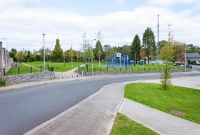 This is where the goods yard of the former Castlecomer station was once sited. This view is looking towards Deerpark. The site is now occupied by a landscaped park and housing estate.