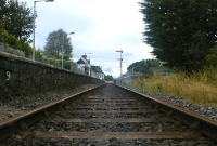A view along the tracks at Castleconnell Station. There was once a single siding and goods loading bank on the right, now occupied by a carpark.