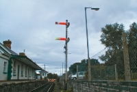 The twin armed semaphore signal at Castleconnell Station, the top arm guarding the crossing gates, and lower distant arm with its distinctive &#39;fishtail&#39; end guarding a further crossing beyond the station.