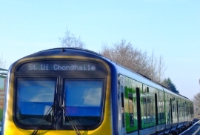 A portrait of 29000 Class No.29119, seen standing at the up platform at Castleknock with a service for Dublin Connolly, or in Irish &#39;Stáisiún Uí Chonghaile&#39; as displayed on the train.
