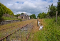 The disused station at Castletown, looking east towards Mullingar from the end of the &#39;Down&#39; platform. A characteristic of Midland Great Western stations was a raised section of platform, still visible on the left. The station closed to passengers in 1963.