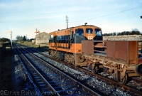 In the days when Castletown was still an important block post on the main line to Galway, 181 Class loco No.183 awaits the road west towards Moate with a goods train in April 1978. In the background can be seen the former goods shed. ©Ernies Railway Archive