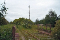 At the south end of Charlestown Station the disused line crosses the small Mullaghanoe River which runs through the town. At this time the track beyond the bridge was heavily overgrown.