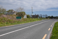 This is the site of Church Cross Station, located on the left of the N71 road at the west end of the village. This view is looking towards Skibbereen.