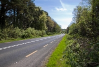 A view of the site of Clonakilty Jct, looking east towards Cork from what was the island platform. After closure in March 1961, the N71 road was realigned through the station site, obliterating much of the station buildings.