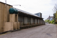 This is the road side of the goods shed at the former Clonakilty Station. The road way seen here also led to the one time cattle loading bank, now demolished.
