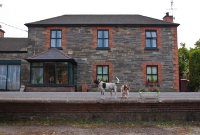 This is the two storey stone built station building at Clonakilty, dating from the opening of the branch line in August 1886. There was once a wooden waiting room on the platform, but this has long disappeared.