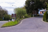 Just north of the footbridge was the County Home level crossing, once sited here where the access road to the hospital crossed the railway line. This view is looking towards Clonakilty.