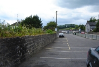 The stone wall marking the eastern approach to Clones Station. A double line existed along this stretch, one line from Dundalk and the other from Portadown.