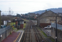 Clonmel Station looking towards Waterford, showing the signal cabin and goods shed. The stub of the closed line to Thurles can be seen to the left opposite the goods siding.