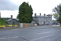 The approach to Clonmel Station. The tower like structure to the eastern end of the building is an unusual feature. Only a small portion of the structure remains in railway use.