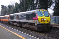 &#39;Enterprise&#39; liveried 201 Class loco No.233 stands at Clonsilla Station while working the Irish Traction Group&#39;s Docklands Pioneer railtour.