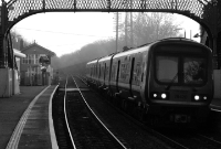 A 29000 Class railcar set consisting of 4-cars arrives into Clonsilla with a morning service from the Docklands in Dublin City.