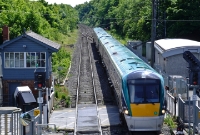 Today the jointed track, semaphore signals and the old station building at Clonsilla has given way to concrete sleepers, long welded rails and colour light signals. 22000 Class railcar No.22005, heading a morning Dublin to Sligo service.