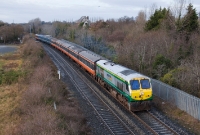 No.215 is captured again at Porterstown, this time heading east back towards Dublin with the return special from Maynooth. The &#39;Santa Special&#39;s consisted of the RPSI&#39;s 1960s built Craven stock.