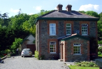 The large station masters house at Colbinstown Station, built of stone and brick. This was typical of the type built by the GSWR on the Tullow branch and found nearly all of the stations.