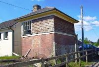 The 18-lever brick built GSWR signal cabin at the northern end of Colbinstown Station remains remarkably intact.