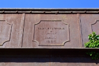 Close up of the manufacture&#39;s stamp on the metal section of this road overbridge at the south end of Colbinstown Station.