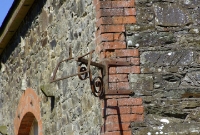 Original oil lamp holder, still attached to the rear of the goods shed at Colbinstown Station.
