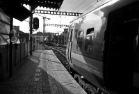 A 2900 Class railcar gets a yellow aspect from the down starting signal at the south end of Connolly Station&#39;s platform 5, which is used by most southbound commuter trains.