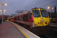 &#39;Enterprise&#39; liveried 201 Class loco No.233 is seen at the head of the Irish Traction Group&#39;s &#39;Docklands Pioneer&#39; railtour. Formed of a Mk3 pushpull stock, the tour operated to the new station in the Docklands Station in the city.