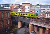 Viewed from the Irish Rail offices at Connolly, an 8550 Class DART approaches the station on the bridge across Amiens Street as it heads a northbound stopping service.