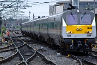 &#39;Enterprise&#39; DVT No.9001 leads a service propelled by a 201 Class loco into Connolly Station with an afternoon service from Belfast. This is the newer and much brighter green and white livery for the cross border train services.
