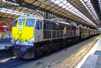 071 Class 086 represents the new order for the 071 Class locomotivs, seen on its silver &#38; black livery while acting as Connolly Station pilot. The coaching stock seen here is the Railway Preservation Society of Ireland&#39;s ex British Rail Mk2 coaches, painted in brunswick green.