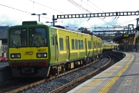 An 8-car 8500 Class DART set, headed by No.8621, stands in the evening sunshine at Connolly Station while working a northbound stopping service to Howth.