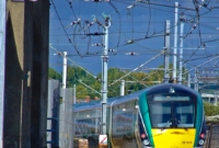 22000 Class railcar No.22325 is seen on the rear of an evening service from Dublin to Sligo. The railcar is seen descending down the single track line from Connolly Station to Newcomen Jct to join the one time Midland Great Western&#39;s goods line from North Wall to Glasnevin.