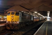 086 is seen preparing to take the ex CIE wooden bodied stock away from the terminal platforms at Connolly Station. The generator van behind the loco is an British Rail Mk1 product of the late 1960s and early 1970s.