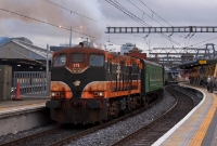 The last remaining 141 Class locomotive in regular service, No.171, is seen creating plenty of smoke as it hauls the RPSI&#39;s ex CIE wooden bodied stock from Connolly Station to Inchicore Works.