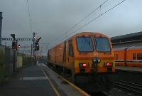 Another 201 Class loco, No.215, is seen awaiting to the road west at the north end of Connolly Station. The illimunated white feather on the signal indicates the loco is probably heading for Inchicore on the west side of Dublin City.