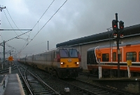 French built De Dietrich driving van trailer No.9001 approaches Connolly from the north with an &#39;Enterprise&#39; service from Belfast. The dull grey livery of the &#39;Enterprise&#39; trains was replaced by a much brighter colour scheme in 2008.