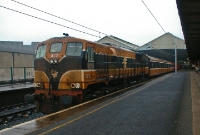 Another 071 Class loco, No.082, is seen on a wet and dull evening at the head of a Dublin to Sligo service at Connolly Station&#39;s platform 4. Sligo services are also now operated by railcars.
