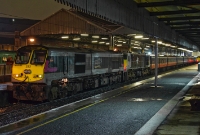 &#39;Enterprise&#39; liveried loco No.233 prepares to take the empty stock of the RPSI &#39;Mystery&#39; train, as well as the failed 071 Class No.080, out of Connolly Station and back to Inchicore Works on the west side of Dublin.