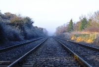 A view looking west towards Maynooth at Porterstown level crossing on a misty morning.