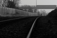 A view looking east towards Coolmine and Dublin. The large concrete carries a nearby road across the railway and Royal Canal at Porterstown.