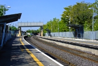 A general view of the suburban Coolmine Station, looking west from the down platform towards Maynooth and Sligo. The platforms at Coolmine are partially staggered.