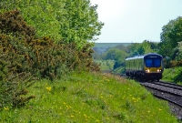 29000 Class railcar No.29121 approaches Coolmine Station with a train from the Docklands to Clonsilla. This service from the Docklands in Dublin has since been extended along the reopened line to Dunboyne.