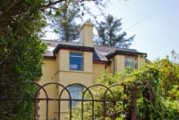 At Creagh the station building was located on the down side of the line, with passengers having to pass through this typical Cork Bandon &#38; South Coast Railway style gate and cross the track to the platform.