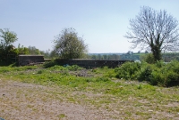This was the site of the one time turntable at Crossbarry, which steam locomotives used while operating on the Kinsale branch. The table was removed after closure of the branch line in 1931.